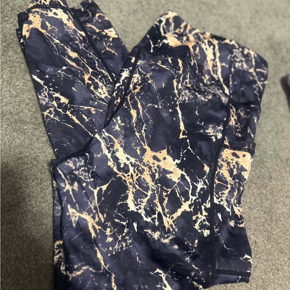 Constantly Varied Gear Black and Gold Marble Capri Leggings